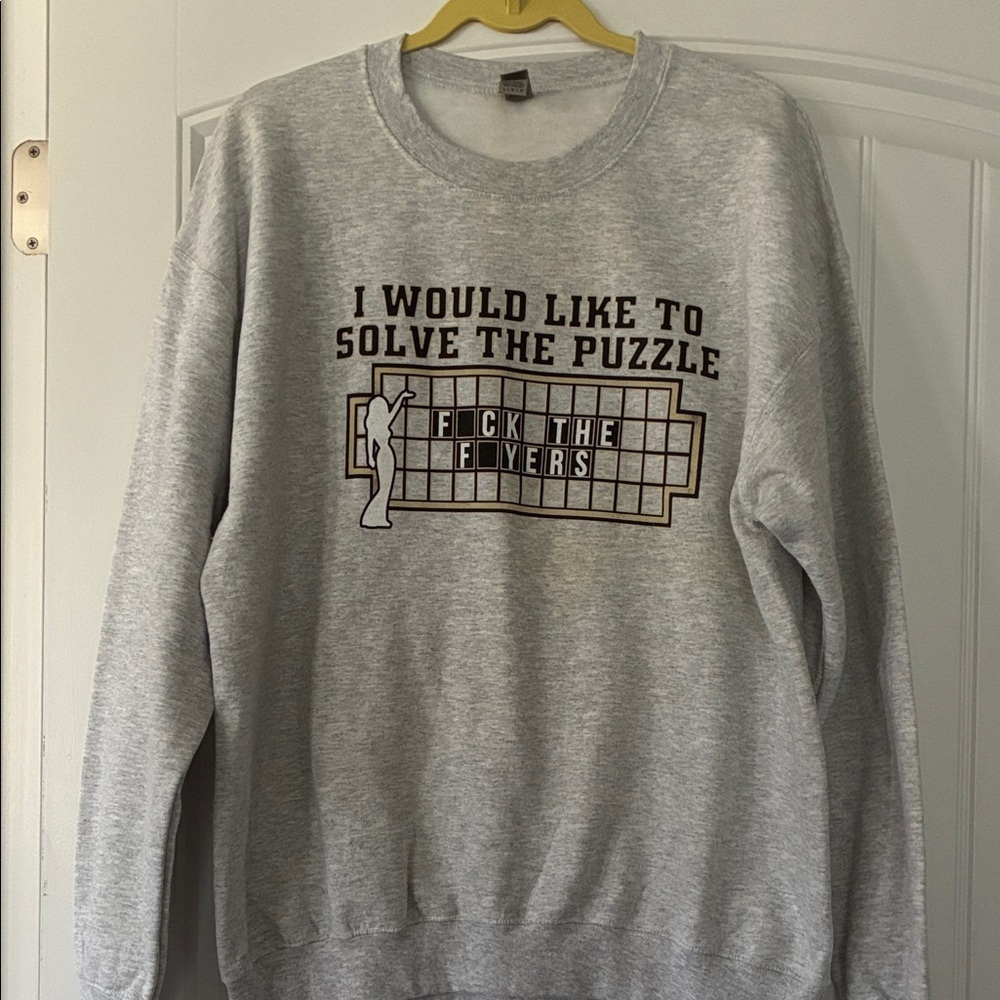 I would like to solve the puzzle 
Fuc* The Flyers Sweatshirt Size Large